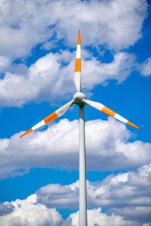Wind turbine, wind energy plant from the manufacturer Enercon, blue sky with many white clouds,