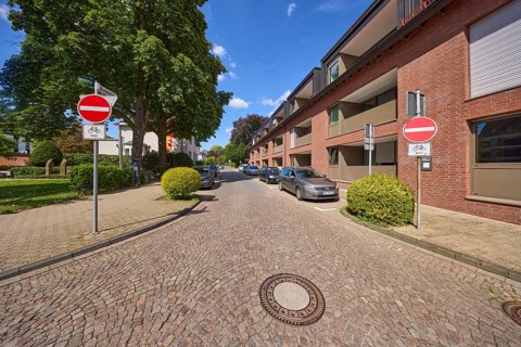 Traffic sign prohibiting entry to the one-way street Nonnenwall with residential buildings in