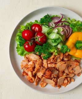 Gyros, chicken, with vegetables on plates, disassembled shawarma, fast food, appetizer, cooking