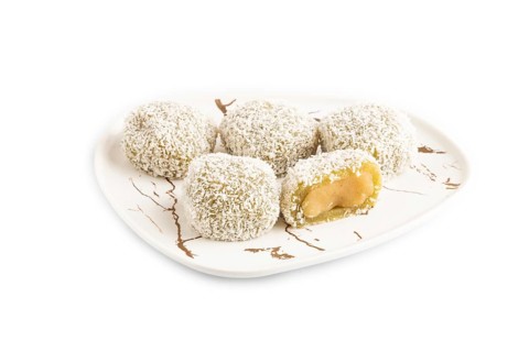 Japanese rice sweet buns mochi filled with pandan jam isolated on white background. side view,