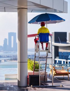 Lifeguard, lifeguard on chair, rooftop pool, swimming pool, Hotel NH Collection The Palm Jumeirah,