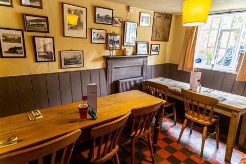 Traditional interior of Kings Head village pub, the Low House, Laxfield, Suffolk, England, UK
