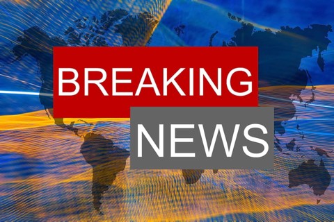 Symbolic image: The words Breaking News on an abstract background