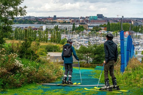 CopenHill, waste incineration plant and artificial ski slope, skiing with a view of Margretheholms