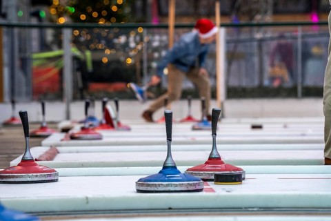 Curling rink at the Christmas market in Düsseldorf, North Rhine-Westphalia, Germany, Europe