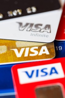 Credit cards from VISA to pay as background in Stuttgart, Germany, Europe