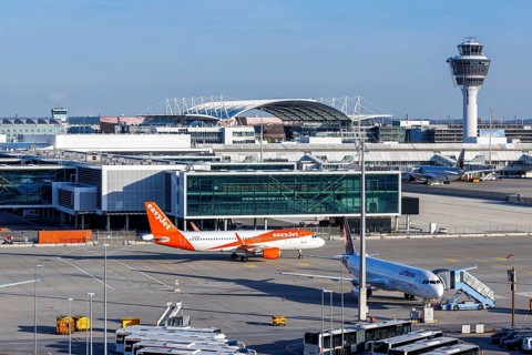 An EasyJet Airbus A320 aircraft, registration G-EZPD, with Terminal 1 extension at Munich Airport,