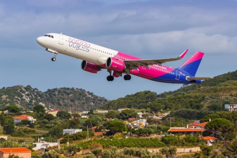 A Wizzair Airbus A321neo aircraft with the registration 9H-WAI at Skiathos Airport, Greece, Europe