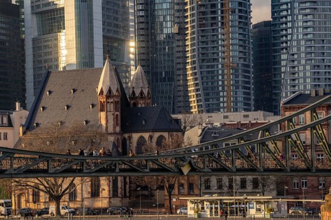 Skyline of the city centre of Frankfurt am Main, river Main, Eiserner Steg bridge, dusk, Hesse,