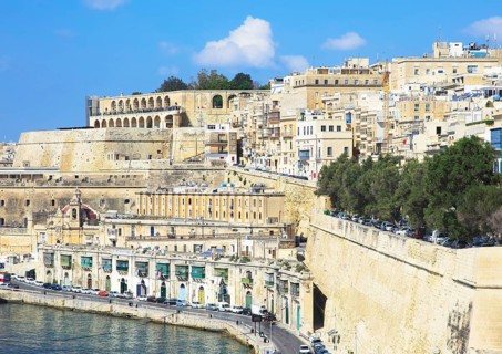 Historic waterfront buildings on Grand Harbour waterside, Valletta, Malta, Europe