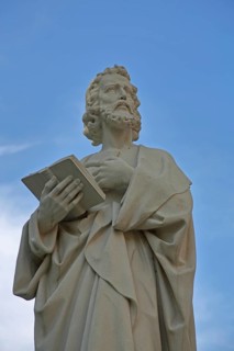 Sculpture of St Mark the Apostle with Bible, Saint, detail, UNESCO St Mary and St Mark's Church,