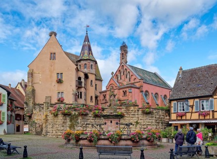 The St. Leon fountain on Saint-Leon Square in the centre of Eguisheim in Alsace. Well-kept