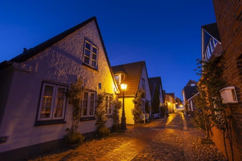 Alley in an old town, twilight, illuminated, Wyk auf Föhr, North Sea island Föhr,