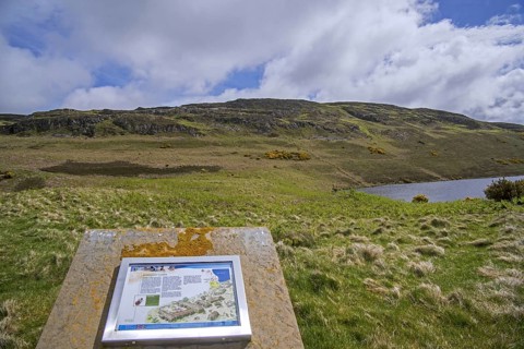 Information board about the Achanlochy Clearance Village on the shore of Loch Duinte near