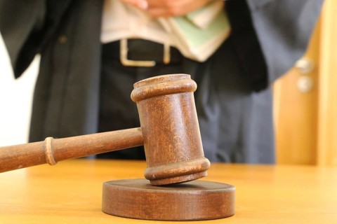 Close-up of a judge's gavel as a symbolic image for a court judgement