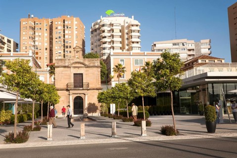 People walking in the newly redeveloped port area of shops and bars Malaga, Spain, Muelle dos,