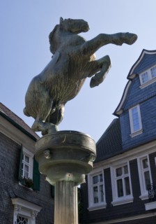 Horse fountain by Rudolf Christian Baisch in front of the town history centre, Mettmann, Bergisches