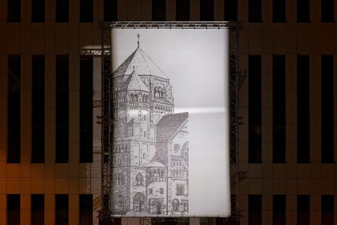 Large photo of the old synagogue at its former location in Kasernenstraße, light installation by