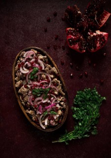 Kuchmachi, Traditional Georgian cuisine, chicken giblets appetizer, with spices and pomegranate