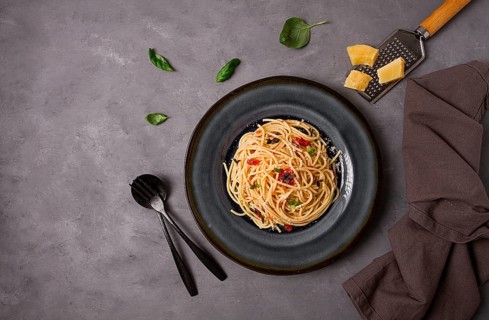 Pasta with tomato sauce and cheese, Italian traditional dish, close-up, no people