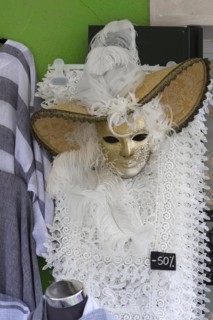 Venetian carnival costume in front of a shop, Burano, Veneto, Italy, Europe