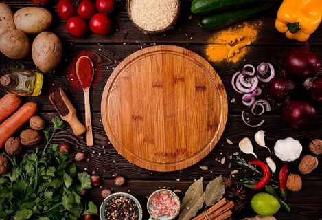 Assortment of ingredients and spices, for cooking, on a wooden background, concept, top view, food