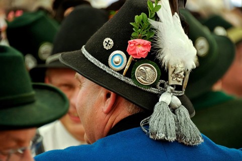 Man of a Bavarian shooting club from Chiemgau in traditional traditional costume, decorated hat