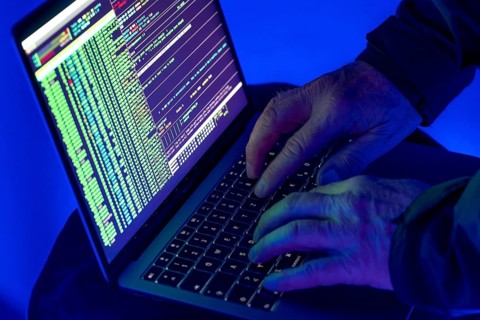 Symbolic image cyber attack, computer crime, cybercrime, computer hackers attack a network,