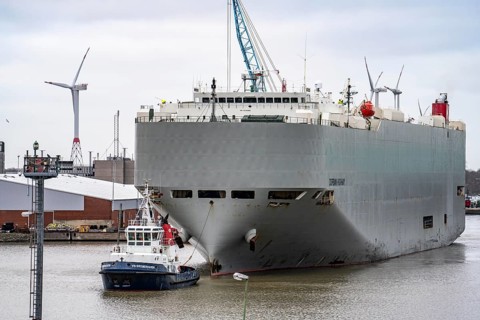 North lock in the overseas harbour of Bremerhaven, the vehicle transporter Durban Highway, under