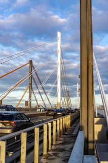 Traffic on the A40 Neuenkamp bridge, piers and stay cables of the new motorway bridge over the