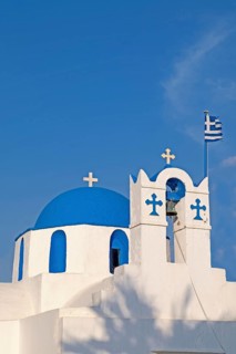 Dome and bell tower of a church in Parikia, Paros, Cyclades, Greece, Europe