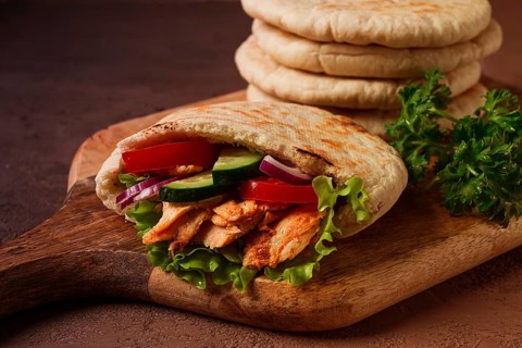 Shawarma in pita bread, chicken, with vegetables, homemade, no people