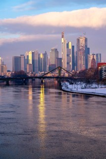 The skyline of Frankfurt am Main, skyscrapers of the banking district, Flößerbrücke, wintry