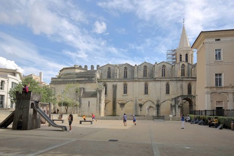 Romanesque church of St-Siffrein and children's playground, Saint, Carpentras, Vaucluse, Provence,