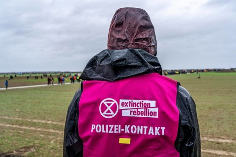 Extinction Rebellion, police contact person, demonstration against the demolition of the lignite