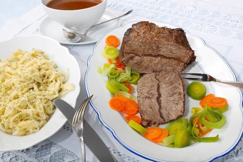 Swabian cuisine, roast beef, roast ox, herb spaetzle, meat dish, gravy, carrot vegetables, leek,