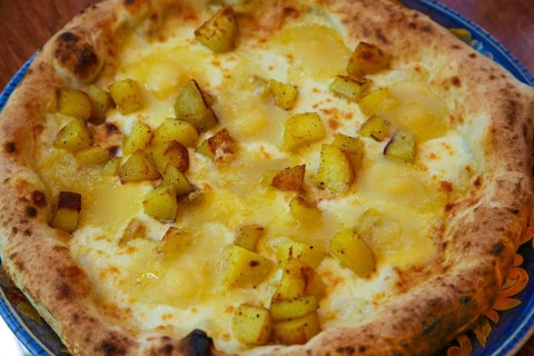 Italian cuisine, Mediterranean cuisine, pizza with potatoes and cheese, Taleggio, baked, from the