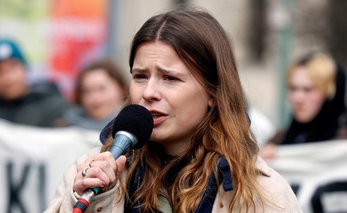 Luisa Neubauer speaks during a demonstration by Fridays for Future for compliance with climate