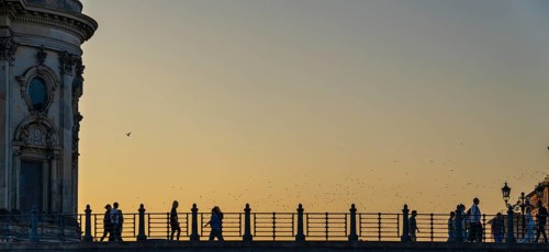 Evening sun, pedestrians on the Karl-Liebknecht-Bridge, Berlin, Germany, Europe