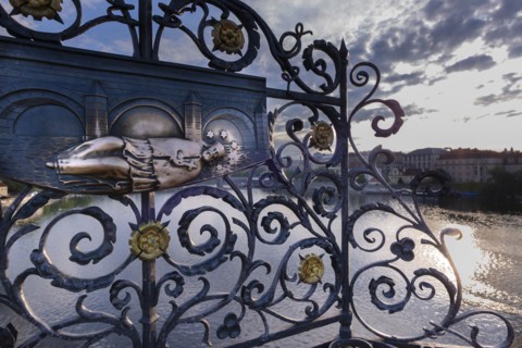 Bronze relief, Saint Nepomuk falling over the bridge, laying hands on the relief is said to bring
