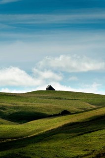 Isolated farm called buron on the Cezallier plateau in the Auvergne Volcanoes Regional Natural