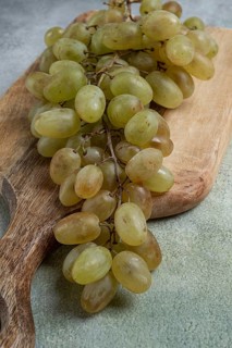 A branch of white grapes, wine grapes, Georgian grape variety Rkatsiteli, top view