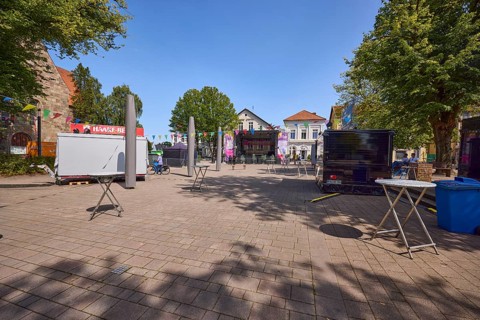 Castle square with food truck and stage for the 900th anniversary celebrations of the town of
