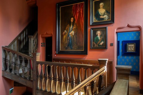 Painted portraits in the Egmond Staircase at Kasteel van Gaasbeek, medieval castle but renovated in