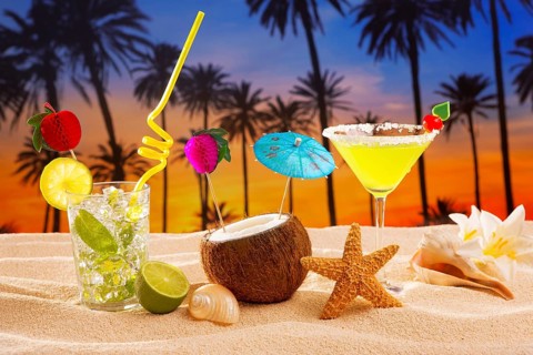 Beach cocktail sunset on palm tree sand mojito margarita coconut