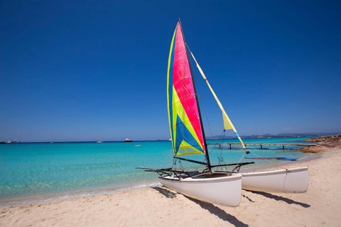 Catamaran sailboat in Illetes beach of Formentera at Balearic Islands