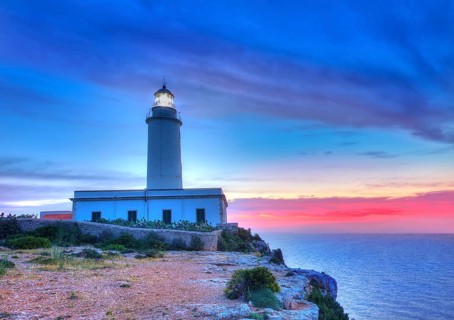 La Mola Cape Lighthouse Formentera at sunrise in Balearic Islands