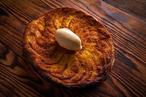 Apple tatin pie cake on puff pastry dessert and ice cream on top