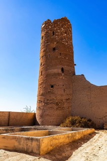 Remains of a former tower in the largest preserved mud town in Oman, Al Bilaad, Al Bilaad