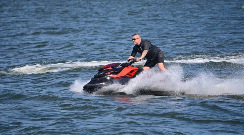 Man on jet ski, water scooter on Baltic Sea, Swinoujscie, Western Pomerania, Poland, Europe